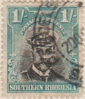 Southern Rhodesia 1924 Postage Stamp 1/- 1S black blue SG # 10 http://www.richterstamps.co.za King George V wearing Naval Cap & Revenue